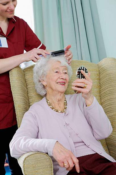 Caregiver enjoying conversation with a senior client